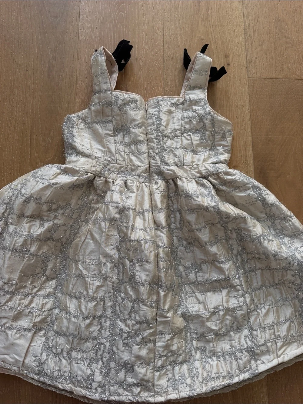 Ivory Metallic Pattern Girls Party Dress with Black Bow Straps